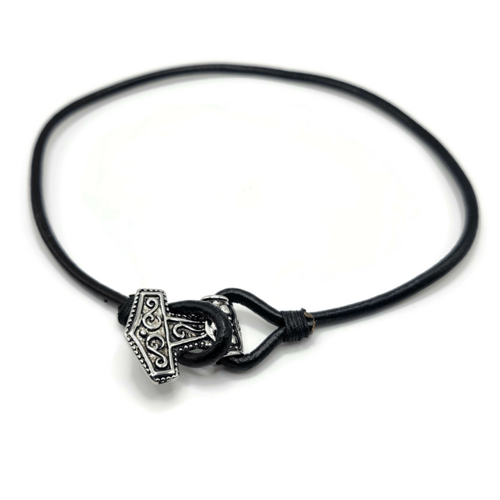 Wear Thor's hammer as a necklace or bracelet. black leather cord. 