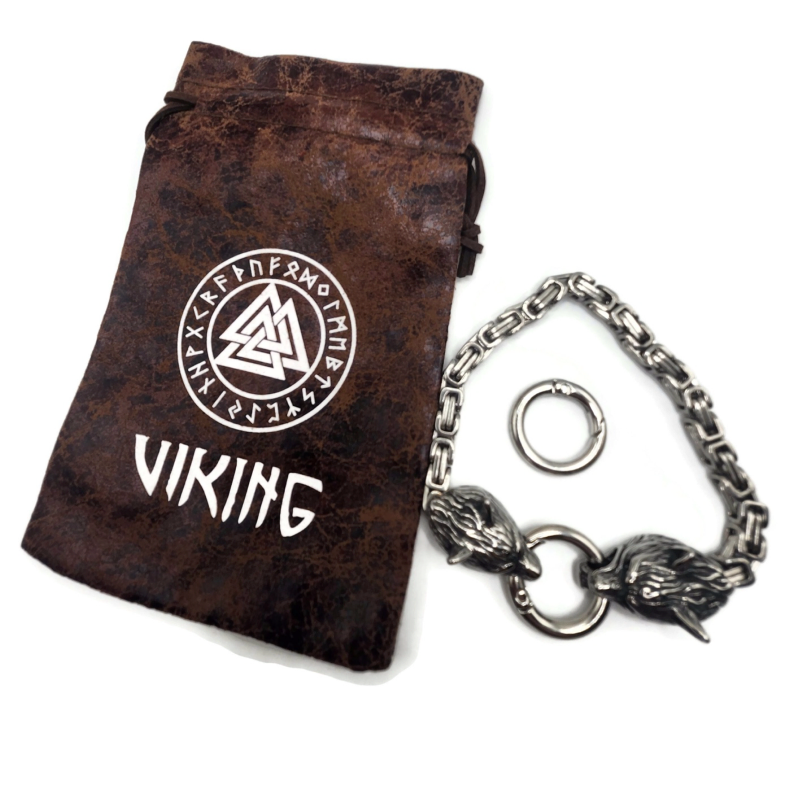Stainless steel Viking wolf bracelet. Brown drawstring bag shown with rune symbols and the word Viking on it. 