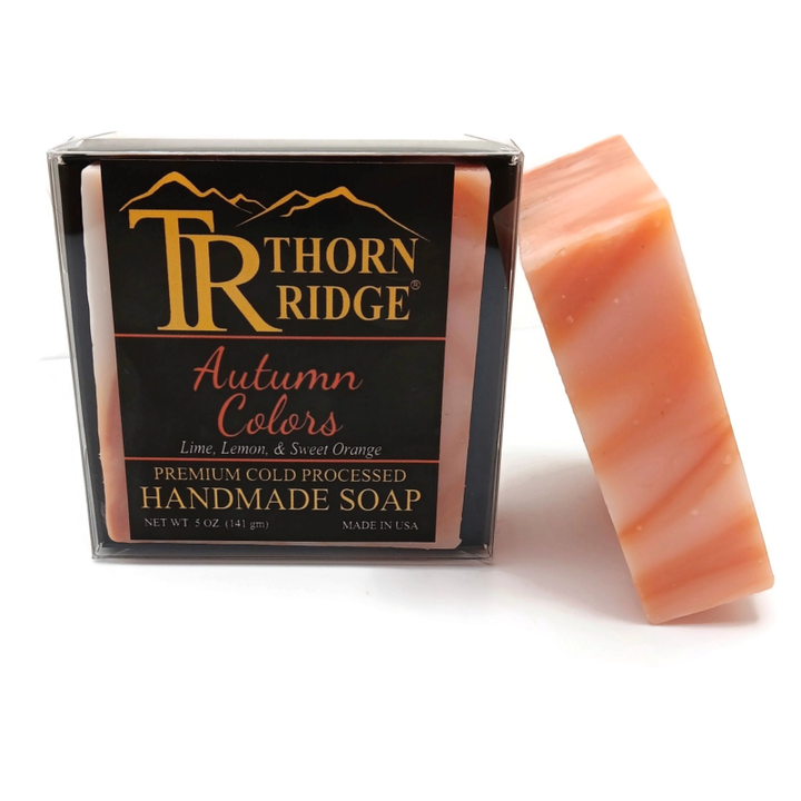 Packaging of Thorn Ridge soap labeled "Autumn Colors," described as lime, lemon, sweet orange, premium cold processed, handmade, 5 oz. Made in USA.