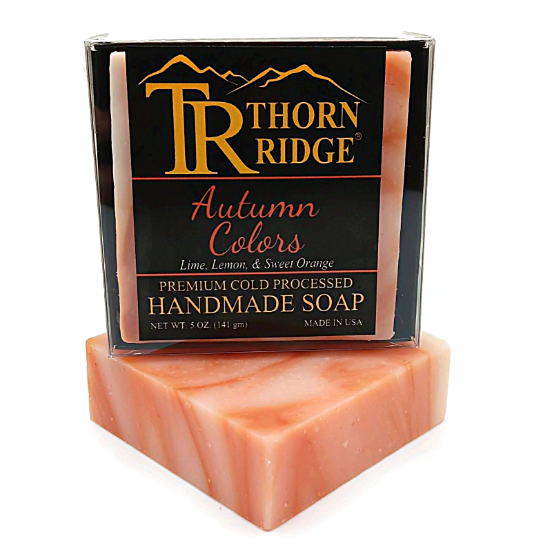 Packaging of Thorn Ridge soap labeled "Autumn Colors," described as lime, lemon, sweet orange, premium cold processed, handmade, 5 oz. Made in USA.