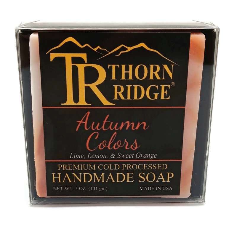 Packaging of Thorn Ridge soap labeled "Autumn Colors," described as lime, lemon, sweet orange, premium cold processed, handmade, 5 oz. Made in USA.