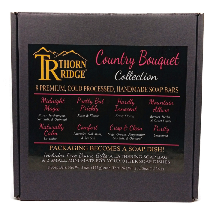 Packaging of Thorn Ridge soap gift set labeled "Country Bouquet Collection," described as containing 8 individually packaged soaps, lathering soap bag, 2 extra mini mats, premium cold processed, handmade, 5 oz each (2 lb 8 oz), Made in USA.