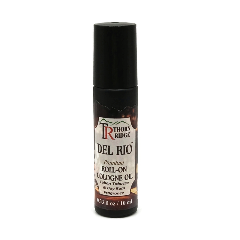 A bottle of Thorn Ridge roll on cologne labeled "Del Rio," described as a Cuban tobacco and bay rum  fragrance. 0.33 fl oz, 10 ml.