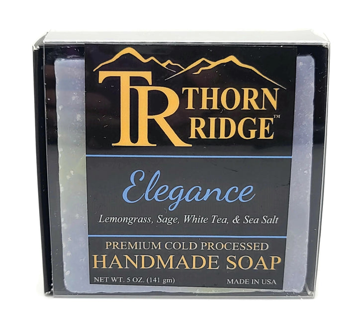 Packaging of Thorn Ridge soap labeled "Elegance," described as lemongrass, sage, white tea, sea salt, premium cold processed, handmade, 5 oz. Made in USA.