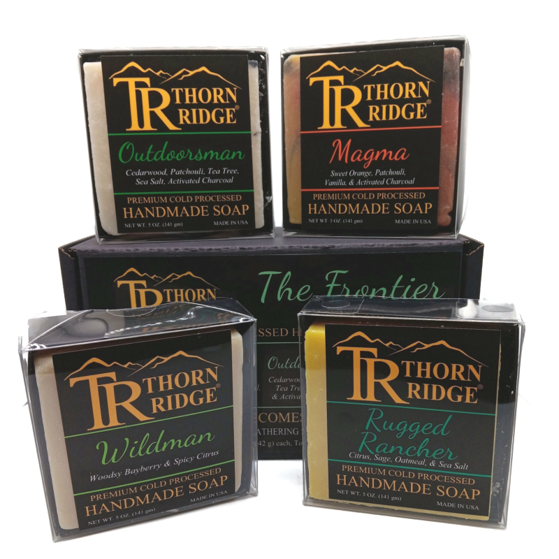 Packaging of Thorn Ridge soap gift set labeled "The Frontier Collection," described as containing 4 individually packaged soaps, lathering soap bag, extra mini mats, premium cold processed, handmade, 5 oz each (1 lb 4 oz), Made in USA.