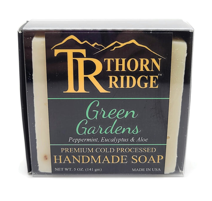 Packaging of Thorn Ridge soap labeled "Green Gardens," described as peppermint, eucalyptus, aloe, premium cold processed, handmade, 5 oz. Made in USA.