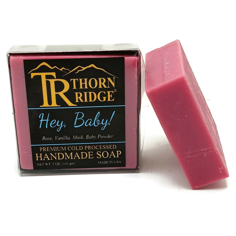 Packaging of Thorn Ridge soap labeled "Hey Baby!," described as rose, vanilla, musk, baby powder, premium cold processed, handmade, 5 oz. Made in USA.