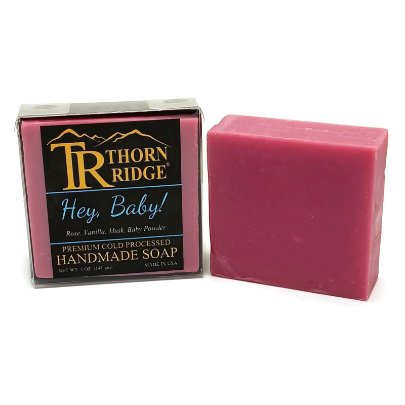 Packaging of Thorn Ridge soap labeled "Hey Baby!," described as rose, vanilla, musk, baby powder, premium cold processed, handmade, 5 oz. Made in USA.