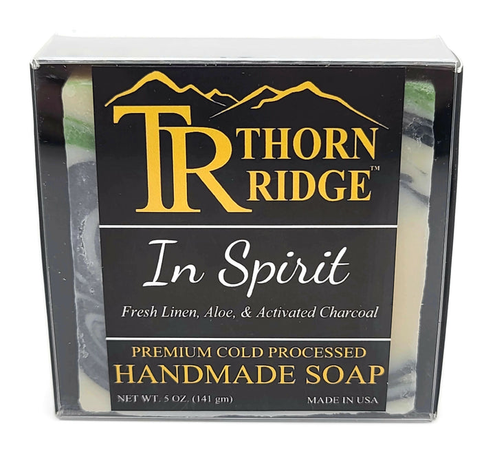 Packaging of Thorn Ridge soap labeled "In Spirit," described as fresh linen, aloe, activated charcoal, premium cold processed, handmade, 5 oz. Made in USA. 