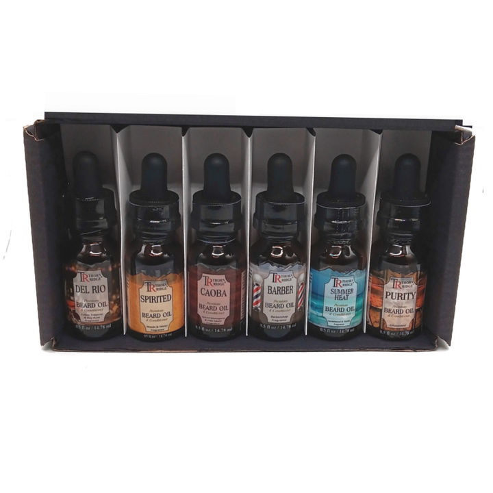 Packaging of Thorn Ridge beard oil gift set labeled "The Miami Collection," described as six sample size signature scent beard oils, 0.5 oz each, net weight 3 oz. Made in USA.