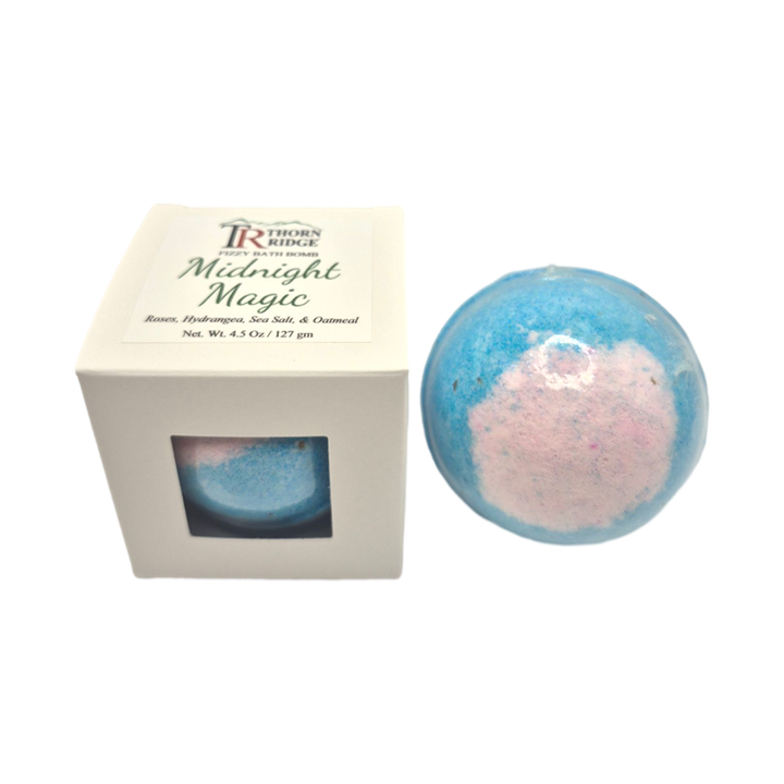 Midnight Magic bath bomb front with box packaging.