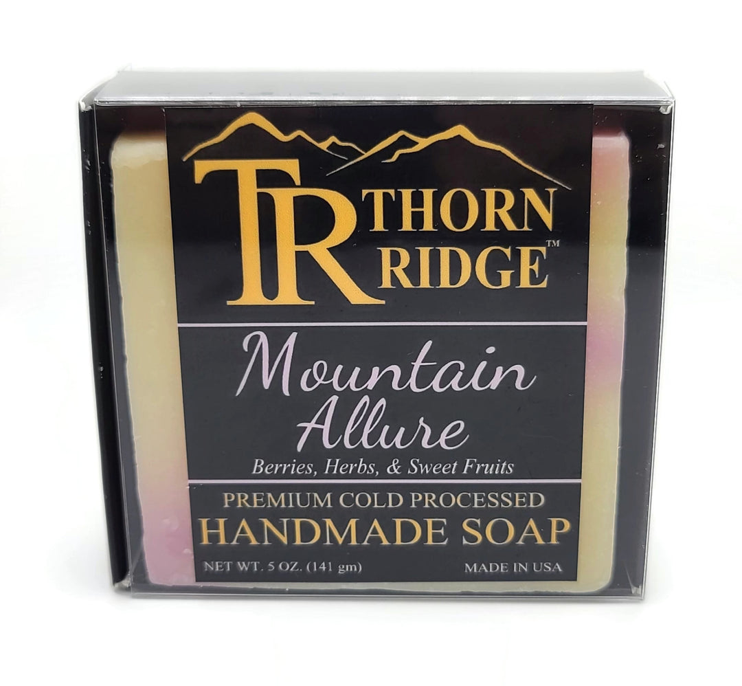 Packaging of Thorn Ridge soap labeled "Mountain Allure," described as berries, herbs, sweet fruits, premium cold processed, handmade, 5 oz. Made in USA.