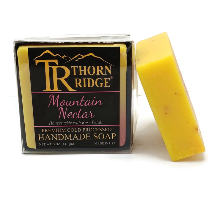 Packaging of Thorn Ridge soap labeled "Mountain Nectar," described as honeysuckle with rose petals, premium cold processed, handmade, 5 oz. Made in USA.