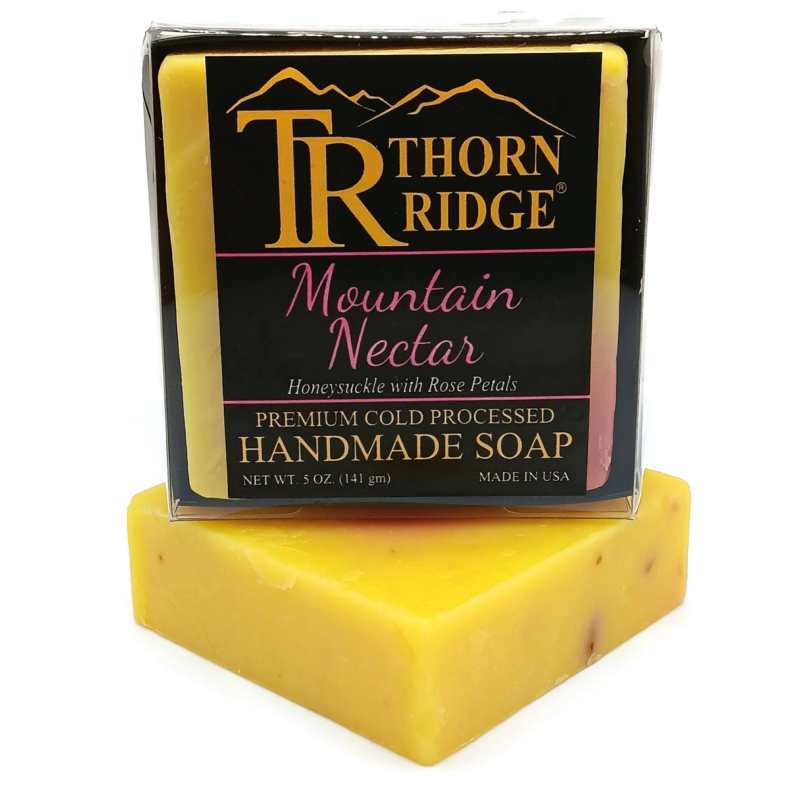 Packaging of Thorn Ridge soap labeled "Mountain Nectar," described as honeysuckle with rose petals, premium cold processed, handmade, 5 oz. Made in USA.