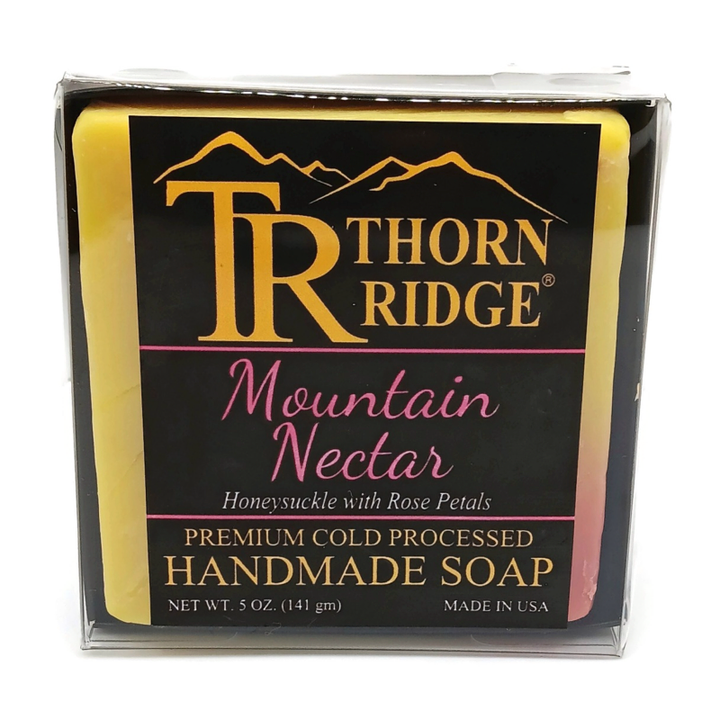 Packaging of Thorn Ridge soap labeled "Mountain Nectar," described as honeysuckle with rose petals, premium cold processed, handmade, 5 oz. Made in USA.