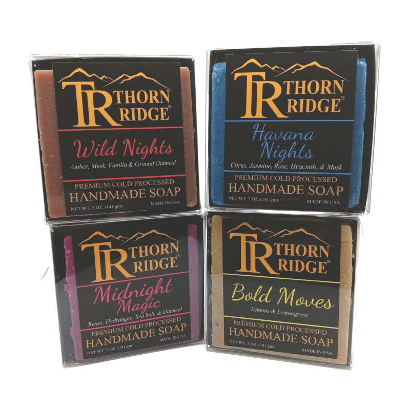 Packaging of Thorn Ridge soap gift set labeled "Night Moves Collection," described as containing 4 individually packaged soaps, lathering soap bag, extra mini mat, premium cold processed, handmade, 5 oz each (1 lb 4 oz), Made in USA.