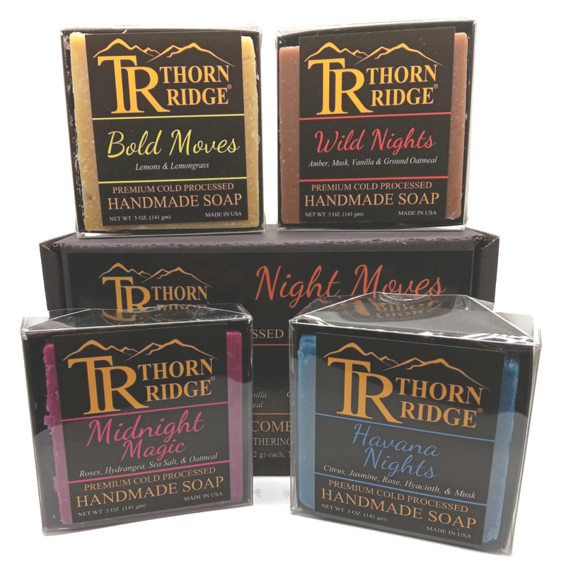 Packaging of Thorn Ridge soap gift set labeled "Night Moves Collection," described as containing 4 individually packaged soaps, lathering soap bag, extra mini mat, premium cold processed, handmade, 5 oz each (1 lb 4 oz), Made in USA.