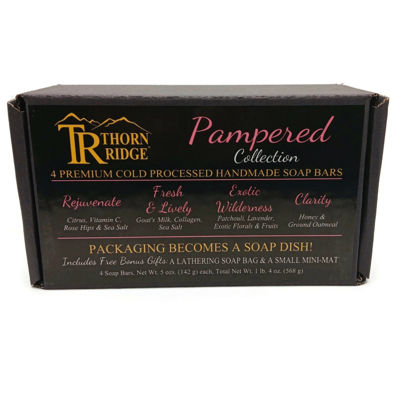 Packaging of Thorn Ridge soap gift set labeled "Pampered Collection," described as containing 4 individually packaged soaps, lathering soap bag, extra mini mat, premium cold processed, handmade, 5 oz each (1 lb 4 oz), Made in USA.