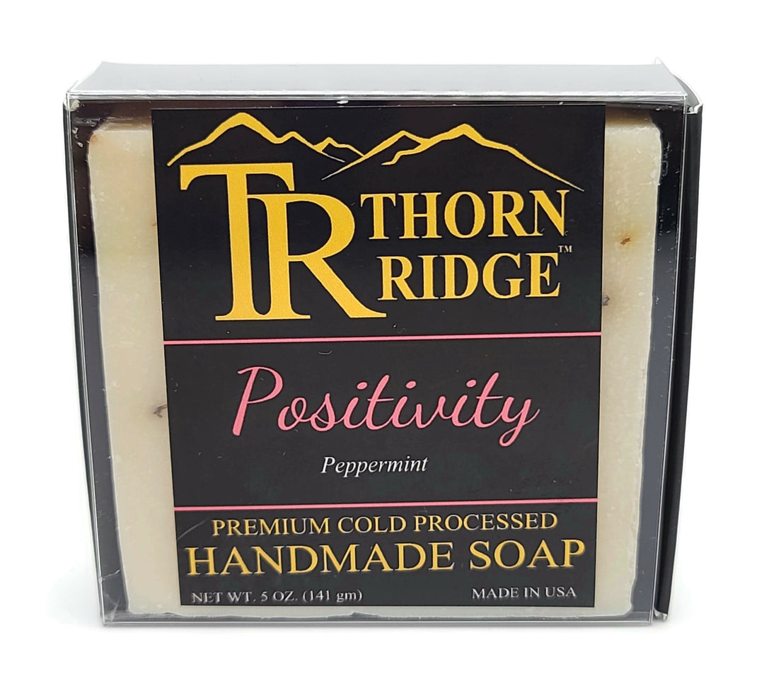  Packaging of Thorn Ridge soap labeled "Positivity," described as peppermint, premium cold processed, handmade, 5 oz. Made in USA.