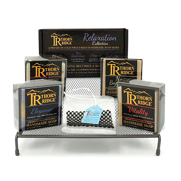 Packaging of Thorn Ridge soap gift set labeled "Relaxation Collection," described as containing 4 individually packaged soaps, lathering soap bag, extra mini mat, premium cold processed, handmade, 5 oz each (1 lb 4 oz), Made in USA.