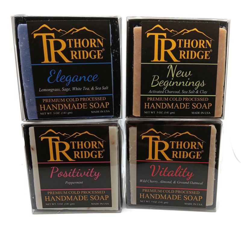 Packaging of Thorn Ridge soap gift set labeled "Relaxation Collection," described as containing 4 individually packaged soaps, lathering soap bag, extra mini mat, premium cold processed, handmade, 5 oz each (1 lb 4 oz), Made in USA.