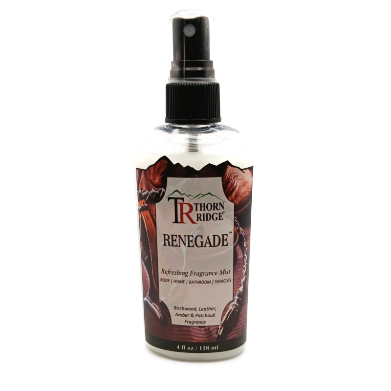 A bottle of Thorn Ridge fragrance mist labeled "Renegade," described as a birchwood, leather, amber and patchouli scent for body, home, bathroom, and vehicles. 4 fl oz.