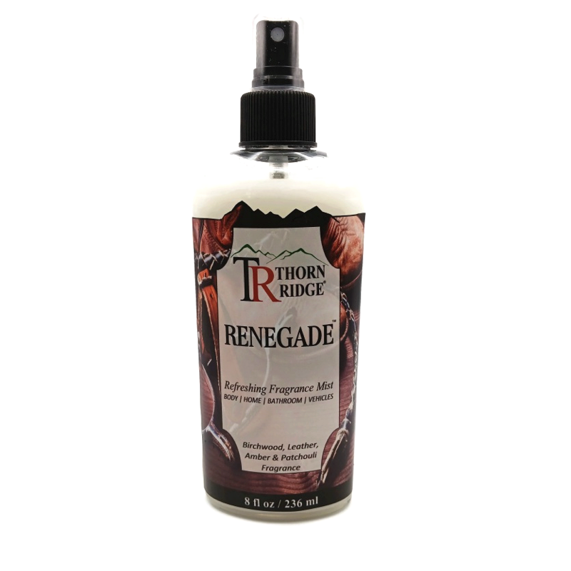 A bottle of Thorn Ridge fragrance mist labeled "Renegade," described as a birchwood, leather, amber and patchouli scent for body, home, bathroom, and vehicles. 8 fl oz.