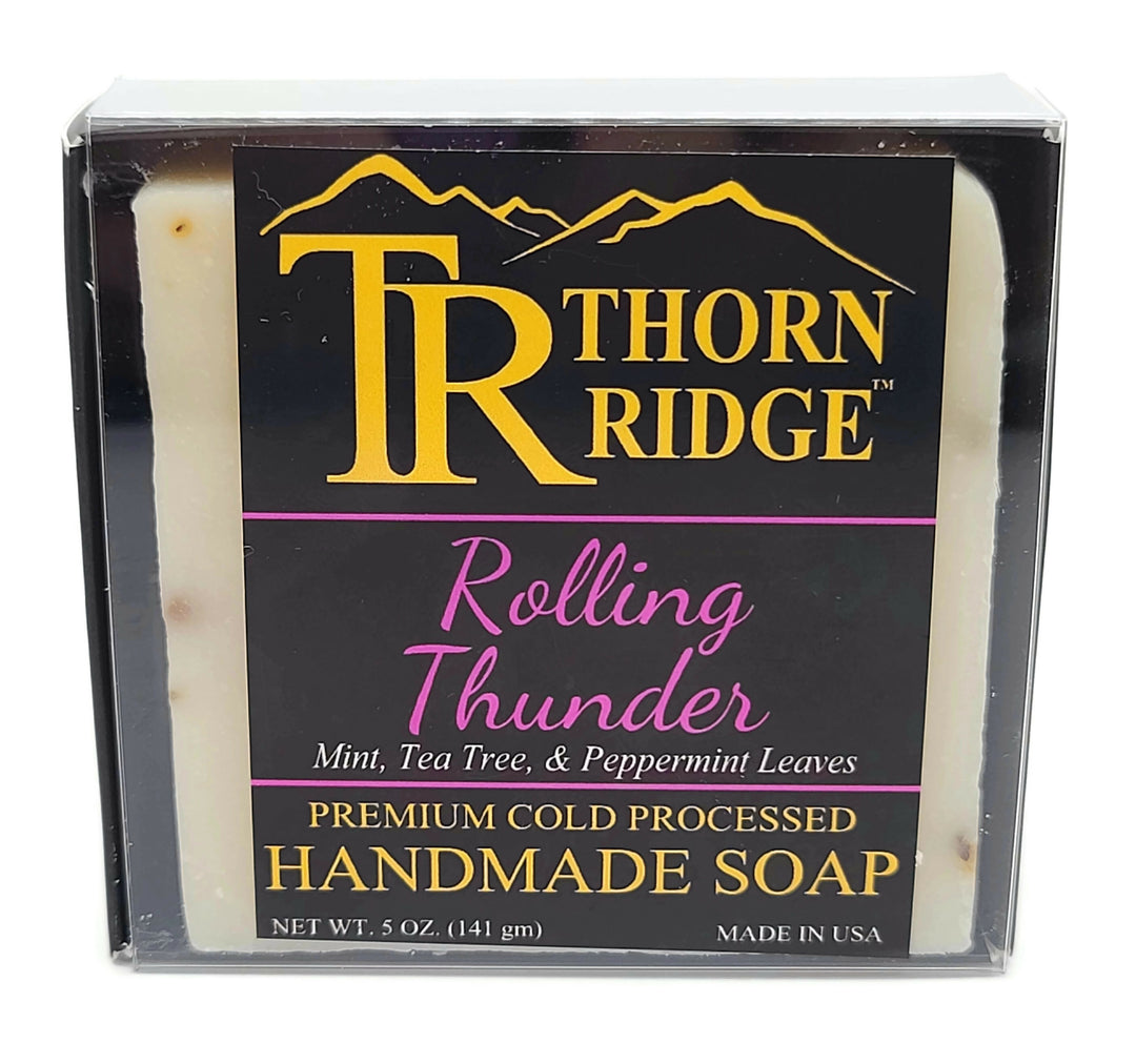 Packaging of Thorn Ridge soap labeled "Rolling Thunder," described as mint, tea tree, peppermint leaves, premium cold processed, handmade, 5 oz. Made in USA.