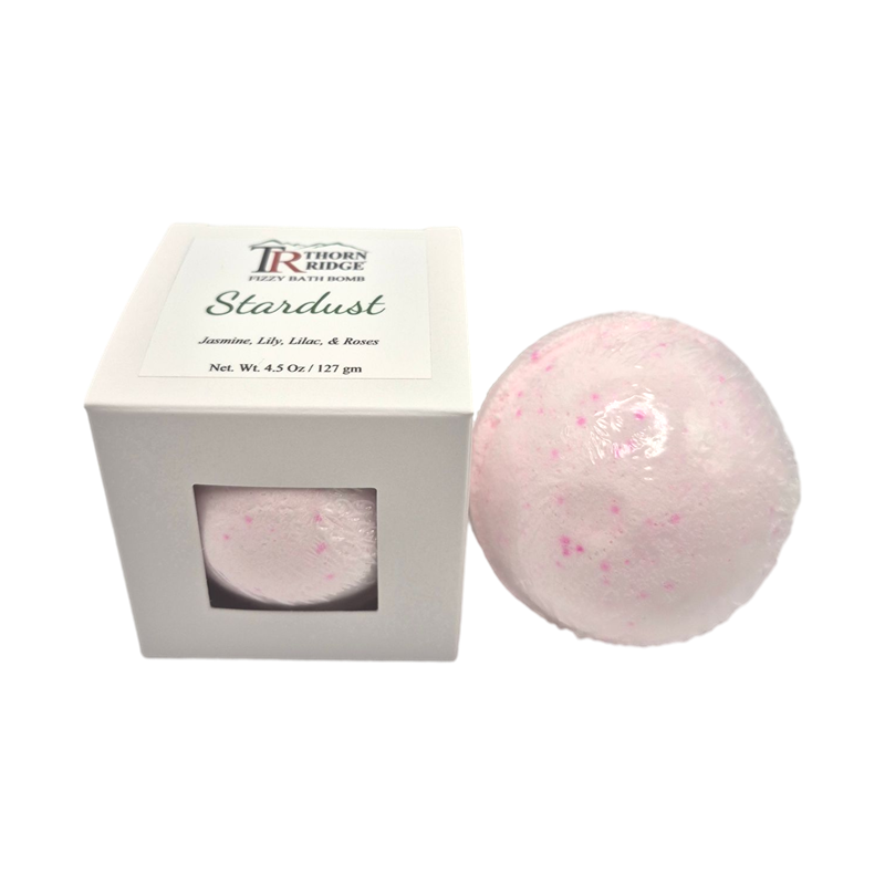 Stardust bath bomb front with box packaging.