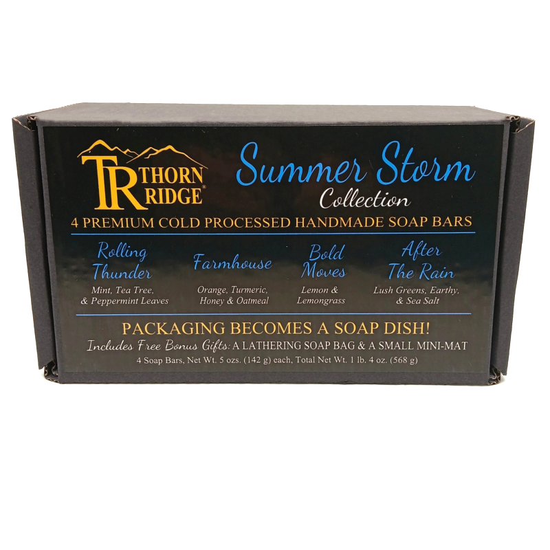 Packaging of Thorn Ridge soap gift set labeled "Summer Storm Collection," described as containing 4 individually packaged soaps, lathering soap bag, mini mat, premium cold processed, handmade, 5 oz each (1 lb 4 oz), Made in USA.