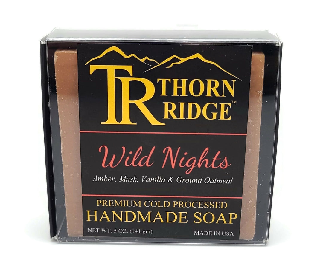 Packaging of Thorn Ridge soap labeled "Wild Nights," described as amber, musk, vanilla, ground oatmeal, premium cold processed, handmade, 5 oz. Made in USA.