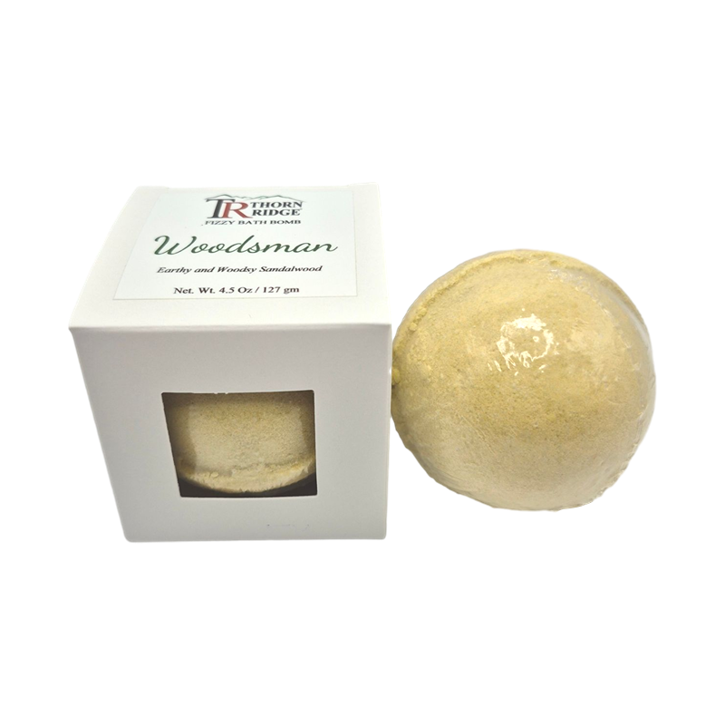 Woodsman bath bomb front with box packaging.