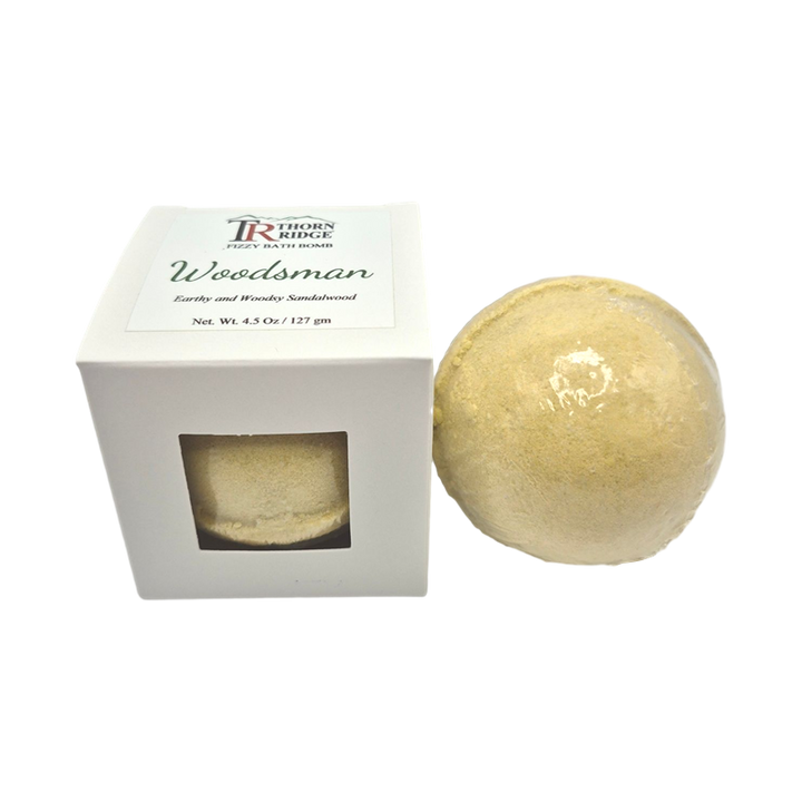 Woodsman bath bomb front with box packaging.