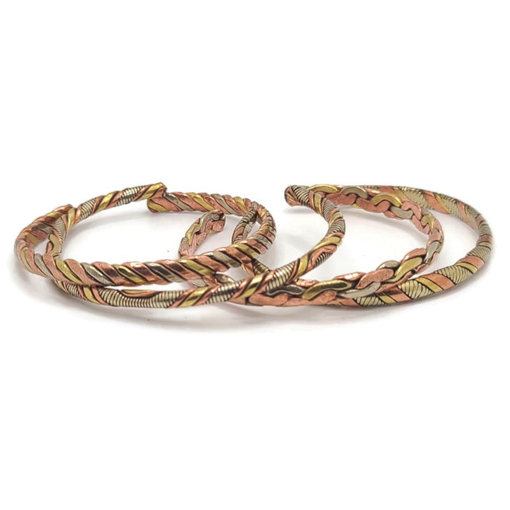 Four Adjustable Brass, Copper & Coin Silver Bangle Bracelets