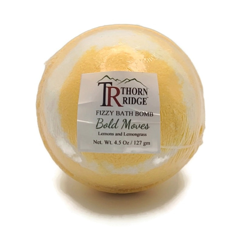 A Thorn Ridge fizzy bath bomb labeled "Bold Moves," described as a lemons and lemongrass fragrance. 4.5 oz.