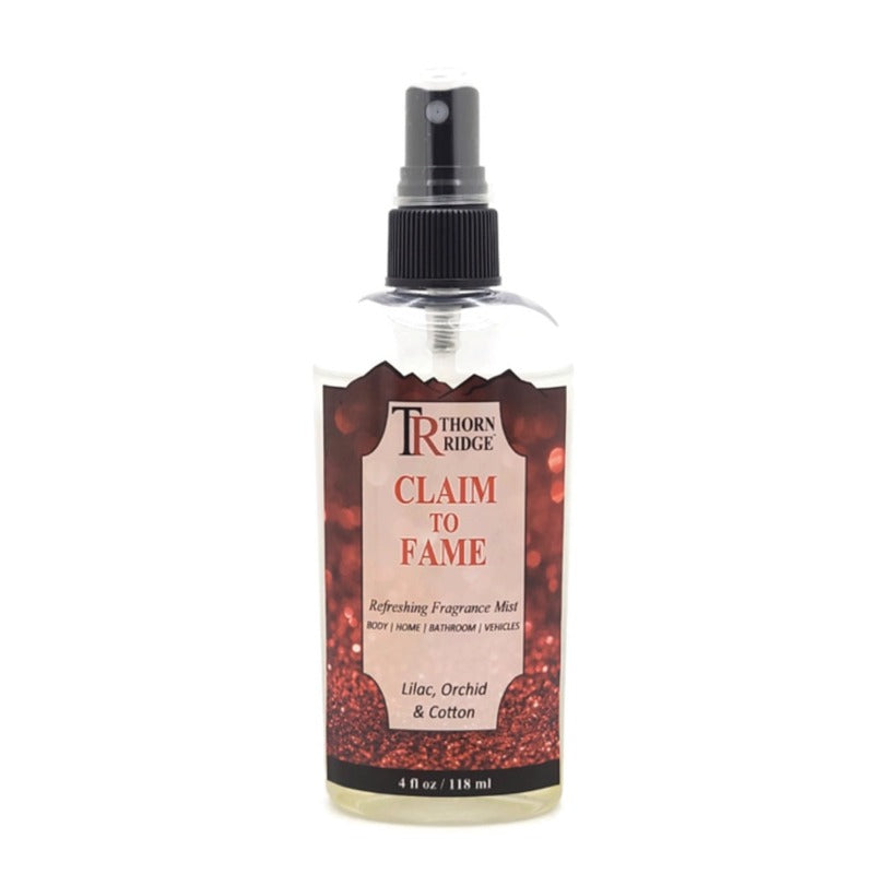 A bottle of Thorn Ridge fragrance mist labeled "Claim To Fame," described as a lilac, orchid, and cotton scent for body, home, bathroom, and vehicles. 4 fl oz.