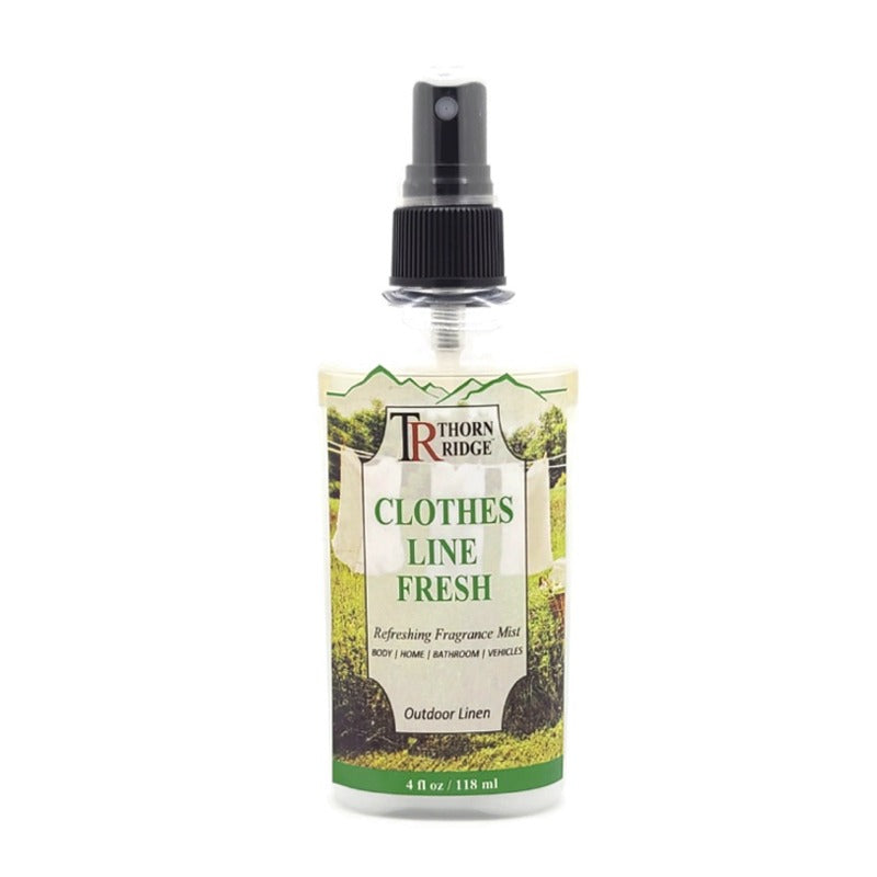 A bottle of Thorn Ridge fragrance mist labeled "Clothes Line Fresh," described as a outdoor linen scent for body, home, bathroom, and vehicles. 4 fl oz.