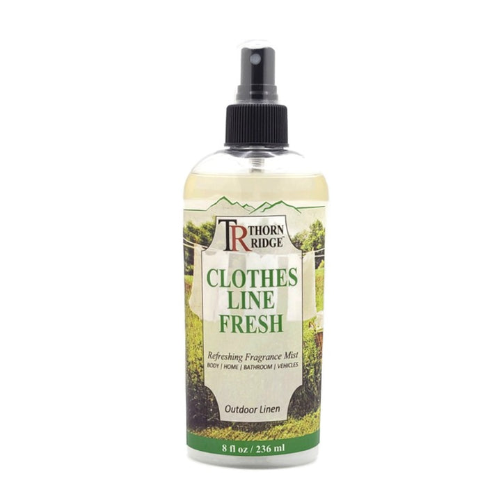 A bottle of Thorn Ridge fragrance mist labeled "Clothes Line Fresh," described as a outdoor linen scent for body, home, bathroom, and vehicles. 8 fl oz.