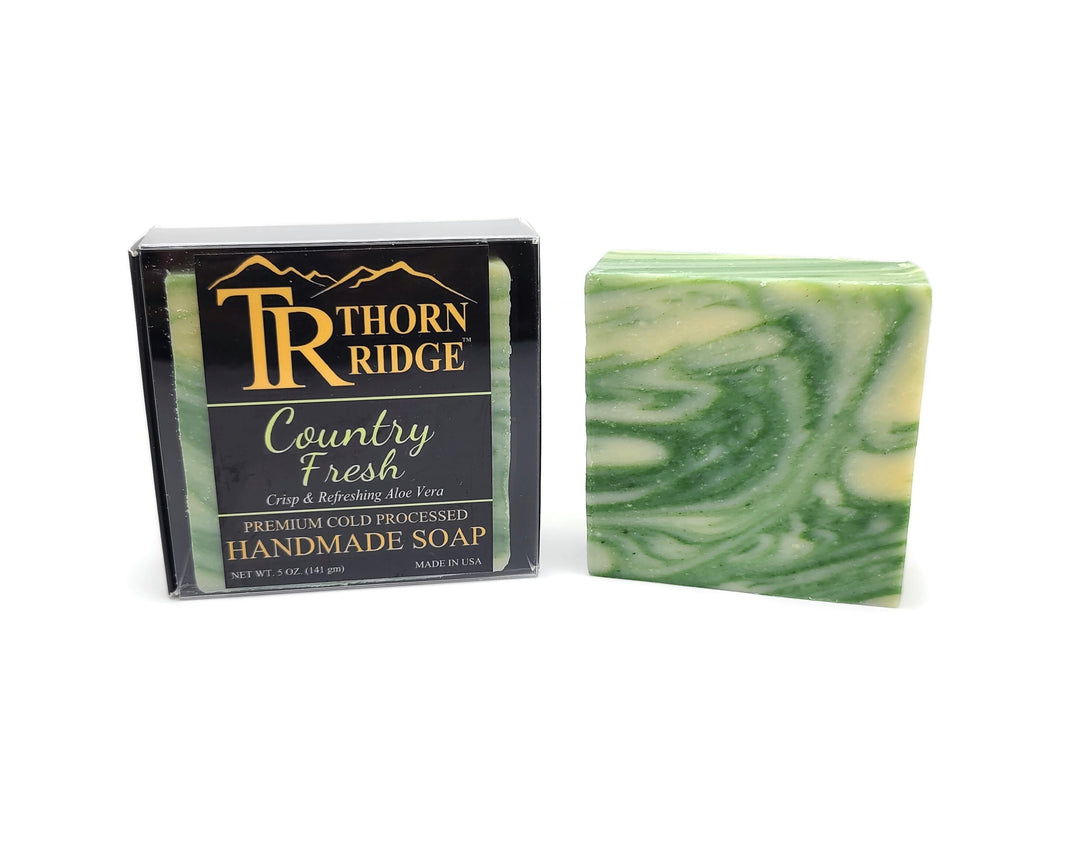 Packaging of Thorn Ridge soap labeled "Country Fresh," described as crisp and refreshing aloe vera, premium cold processed, handmade, 5 oz. Made in USA.