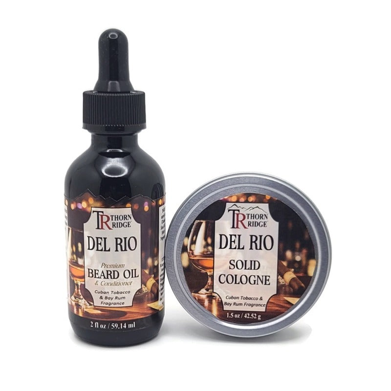 Packaging of Thorn Ridge gift set containing a 2 oz bottle of beard oil and a 1.5 oz tin can of solid cologne described as a Cuban tobacco and bay rum fragrance and labeled "Del Rio," Made in USA.