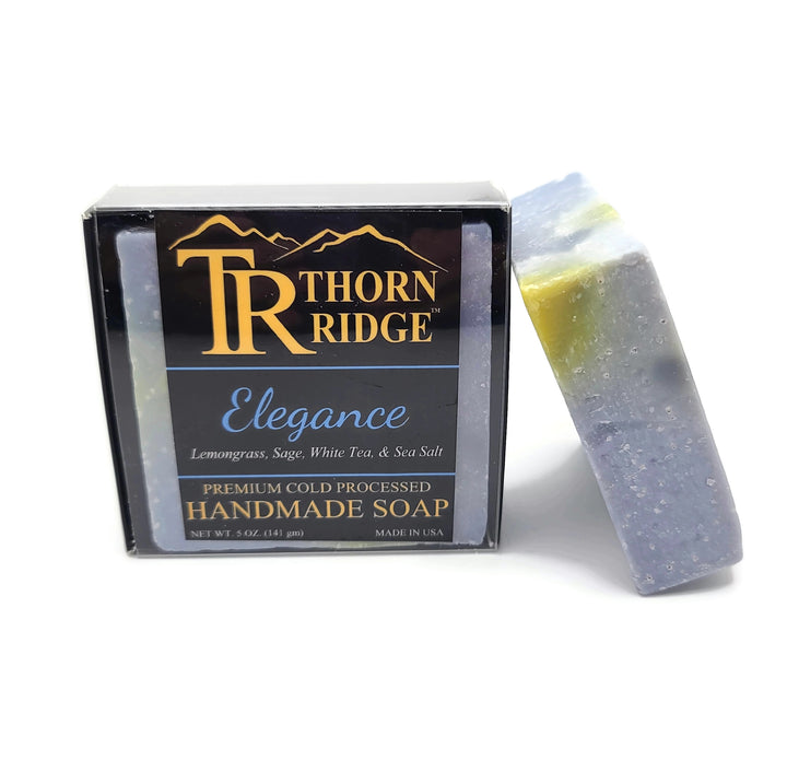 Packaging of Thorn Ridge soap labeled "Elegance," described as lemongrass, sage, white tea, sea salt, premium cold processed, handmade, 5 oz. Made in USA.