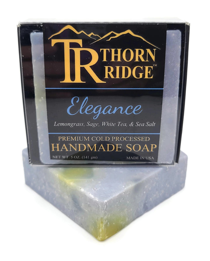 Packaging of Thorn Ridge soap labeled "Elegance," described as lemongrass, sage, white tea, sea salt, premium cold processed, handmade, 5 oz. Made in USA.