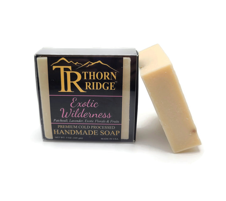 Packaging of Thorn Ridge soap labeled "Exotic Wilderness," described as patchouli, lavender, exotic florals and fruits, premium cold processed, handmade, 5 oz. Made in USA.