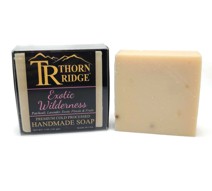 Packaging of Thorn Ridge soap labeled "Exotic Wilderness," described as patchouli, lavender, exotic florals and fruits, premium cold processed, handmade, 5 oz. Made in USA.