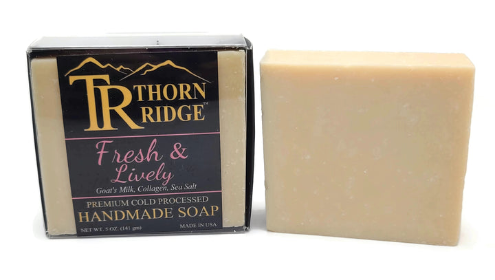 Packaging of Thorn Ridge soap labeled "Fresh and Lively" described as goat's milk, collagen, sea salt, premium cold processed, handmade, 5 oz. Made in USA.