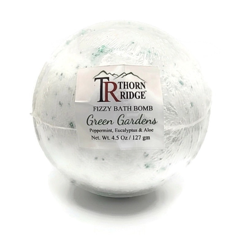 A Thorn Ridge fizzy bath bomb labeled "Green Gardens," described as a peppermint, eucalyptus and aloe fragrance. 4.5 oz.