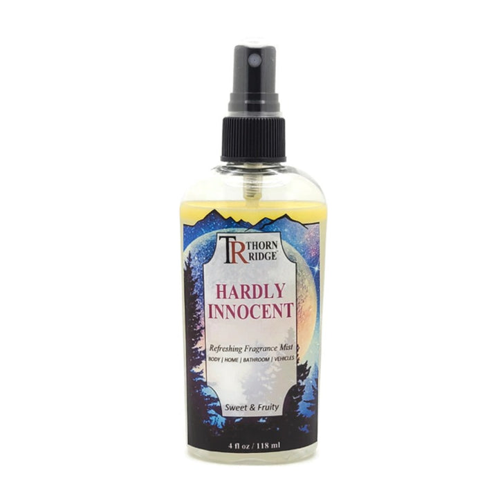 A bottle of Thorn Ridge fragrance mist labeled "Hardly Innocent," described as a sweet and fruity scent for body, home, bathroom, and vehicles. 4 fl oz.