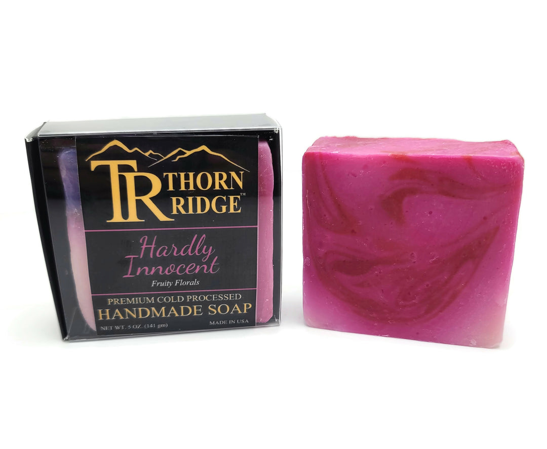 Packaging of Thorn Ridge soap labeled "Hardly Innocent" described as fruity florals, premium cold processed, handmade, 5 oz. Made in USA.