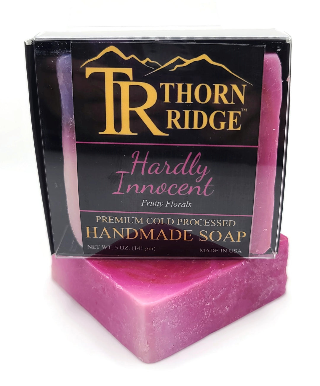 Packaging of Thorn Ridge soap labeled "Hardly Innocent" described as fruity florals, premium cold processed, handmade, 5 oz. Made in USA.