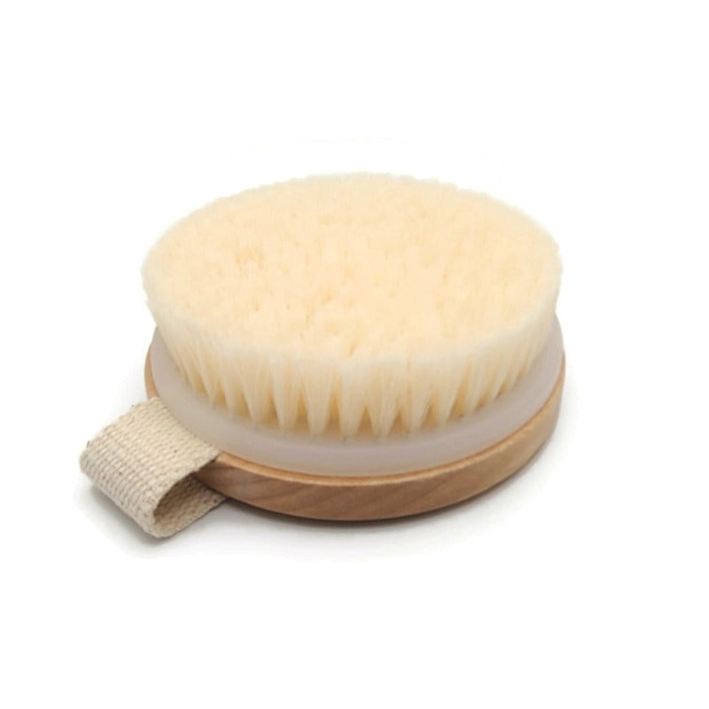 Thorn Ridge Ranch® round face brush for horses, soft bristles with a woven strap that goes over your hand.